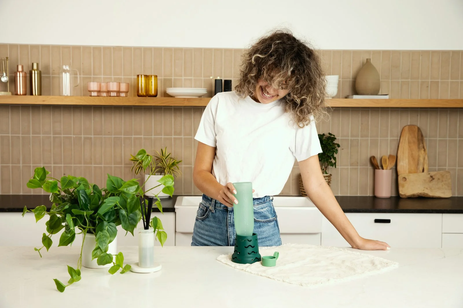 a person painting a plant